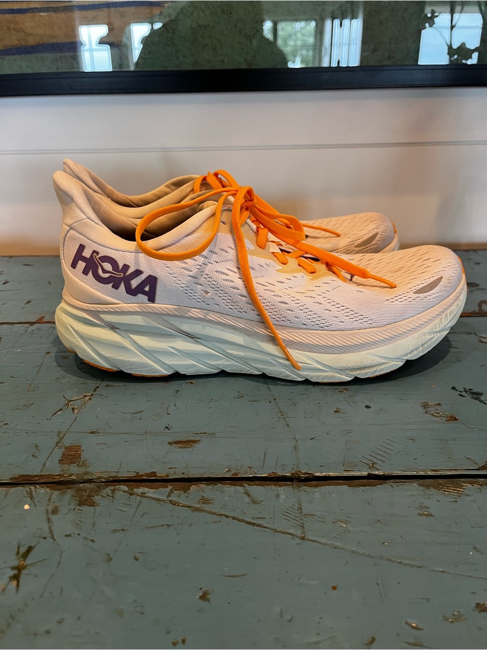 Hoka Women’s White Foam Running Shoes with Orange Laces